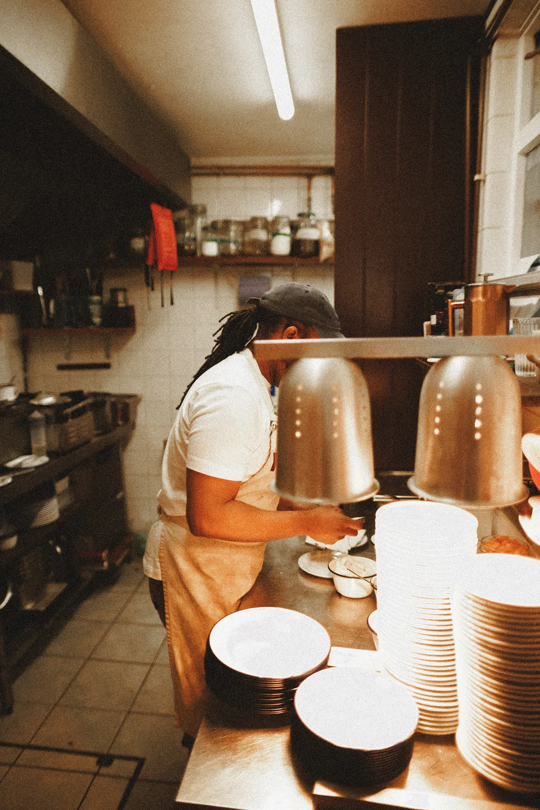 Daniel cooking in the Mauby kitchen at the pass